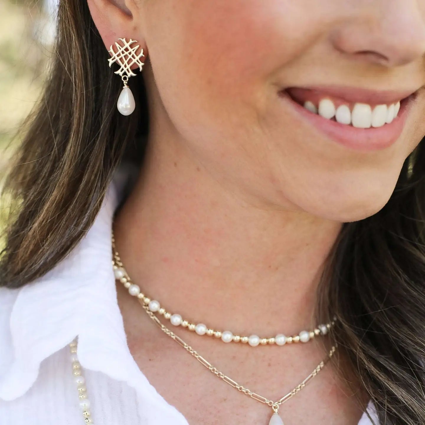 Adorned Logo Pearl Drop Earrings in Gold - Natalie Wood